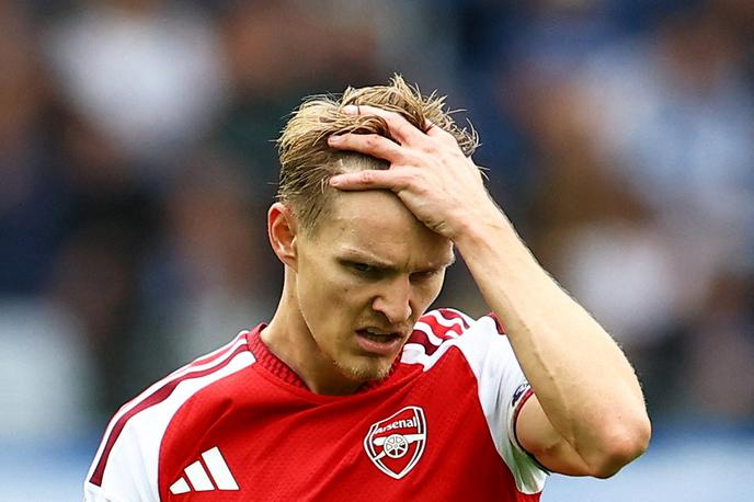 Martin Odegaard | Kapetan Arsenala Martin Odegaard na gostovanju v Brightonu ni skrival slabe volje. | Foto Reuters