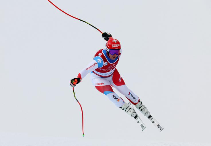 Feuz je na zadnjem smuku sicer premagal Kildeja, a mu je zmanjkalo 13 točk. | Foto: Reuters