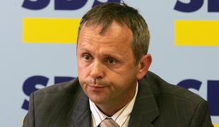 Poslancu SDS pogojna kazen zaradi razžalitve strankarskega kolega