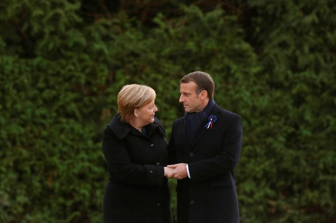 Merkel Macron | Merklova in Macron sta s podpisom dokumenta na 56. obletnico sklenitve elizejske pogodbe potrdila nov dogovor o prijateljstvu in krepitvi že tako tesnih odnosov med državama. | Foto Reuters