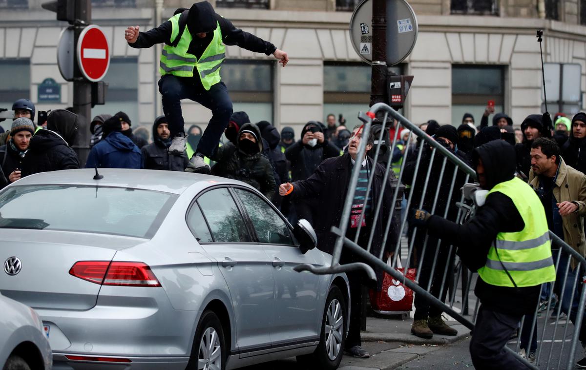 protesti Pariz Francija rumeni jopiči | Protestniki gibanja rumenih jopičev so v soboto že dvanajstič zapored preplavili trge in ulice francoskih mest. | Foto Reuters