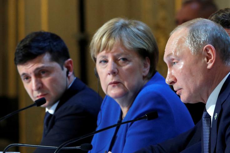 Vladimir Putin, Angela Merkel in takrat novopečeni ukrajinski predsednik Volodimir Zelenski na dogodku leta 2019 | Foto: Reuters