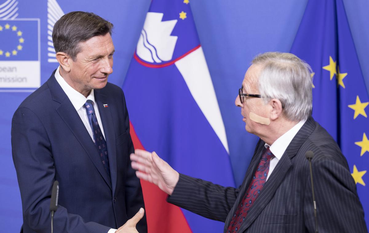 Borut Pahor in Jean-Claude Juncker | To ni bil klasičen, dolgočasen protokolarni obisk, je ocenil Pahor po srečanju s predsednikom Evropskega sveta Donaldom Tuskom, s katerim je sklenil dvodnevni obisk v Bruslju, ki po njegovih besedah dviguje ugled Slovenije. | Foto STA