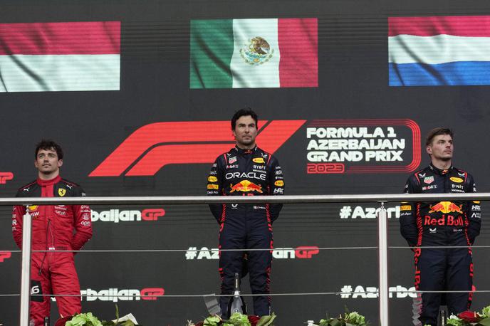 Baku Sergio Perez Red Bull | Zmagal je Perez. Leclerc se je postavil na drugo stopničko, a je bil tretji. So pa hitro zamenjali zastavi. | Foto Reuters