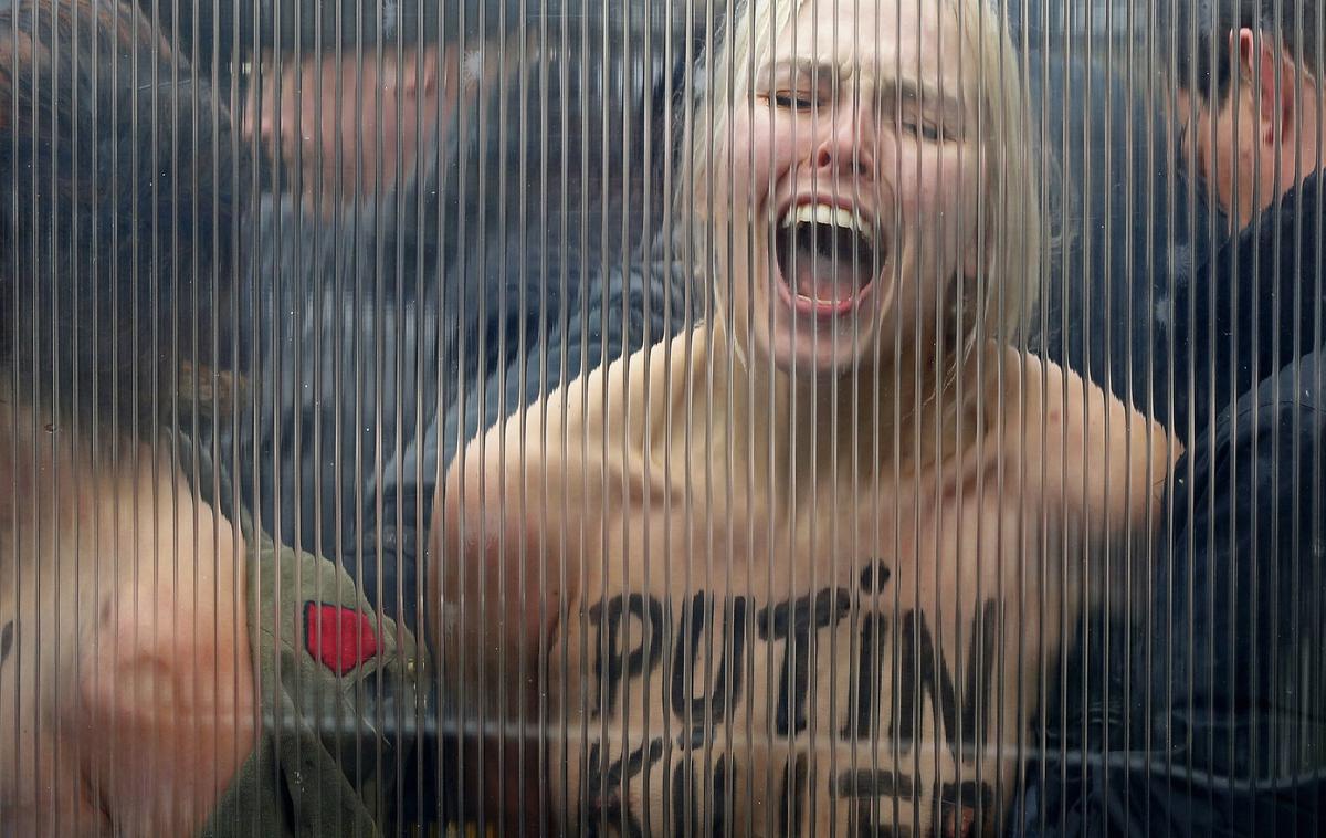 Femen, protest proti Putinu | Ukrajina je država, ki ji Putinova Rusija odreka pravico do obstoja. | Foto Reuters