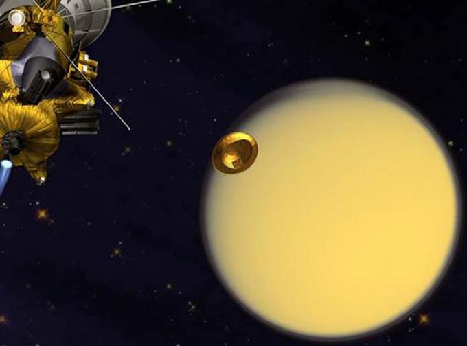 Huygens se je ločil od sonde Cassini (zgoraj levo) in nadaljeval pot proti Titanu. Računalniška grafika, ki jo je 24. decembra 2004, dan pred ločitvijo plovil, izdala vesoljska agencija Nasa. | Foto: NASA