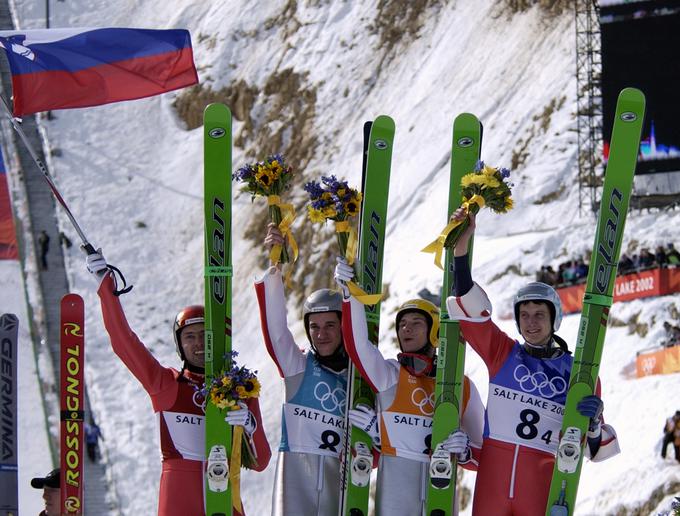 Damjan Fras, Primož Peterka, Robert Kranjec in Peter Žonta – bronasti na ekipni tekmi leta 2002. | Foto: Guliverimage