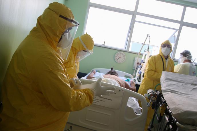 Koronavirus v Braziliji | Po podatkih Reutersa se je število okužb od začetka pandemije v petek približalo 14 milijonom.  | Foto Reuters