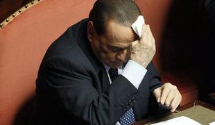 Berlusconija izsiljeval podjetnik, ki naj bi ga oskrboval z dekleti