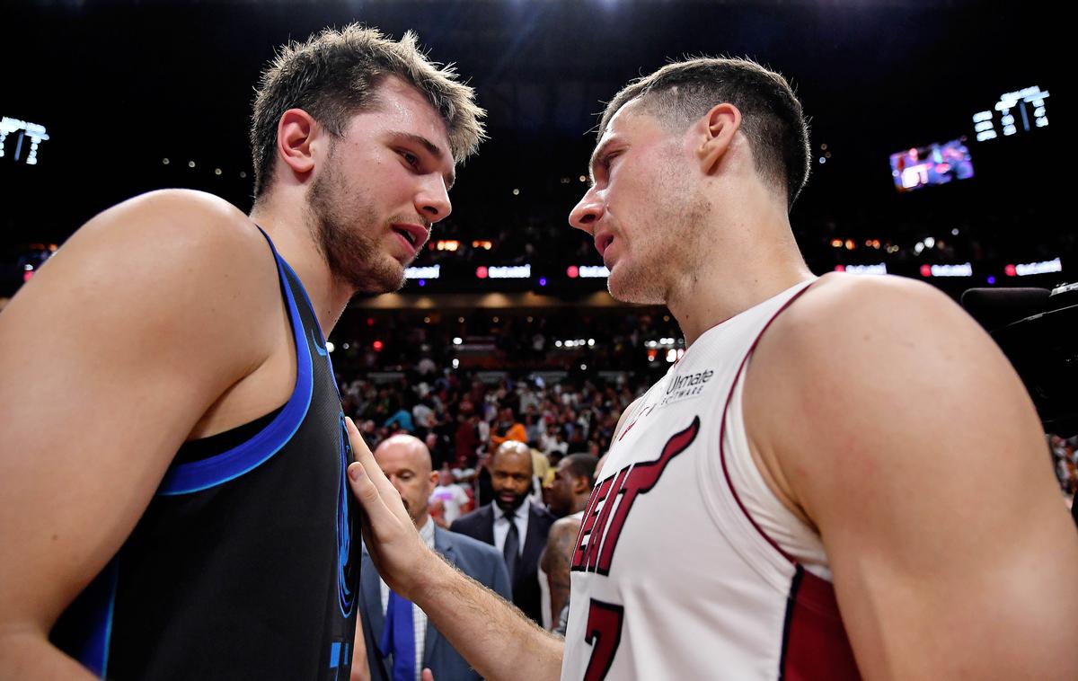 Luka Dončić Goran Dragić | Goran Dragić in Luka Dončić sta se na dvoboju v Miamiju prvič pomerila v ligi NBA. | Foto Reuters