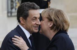 Merklova in Sarkozy za sankcije za države s presežnim primanjkljajem