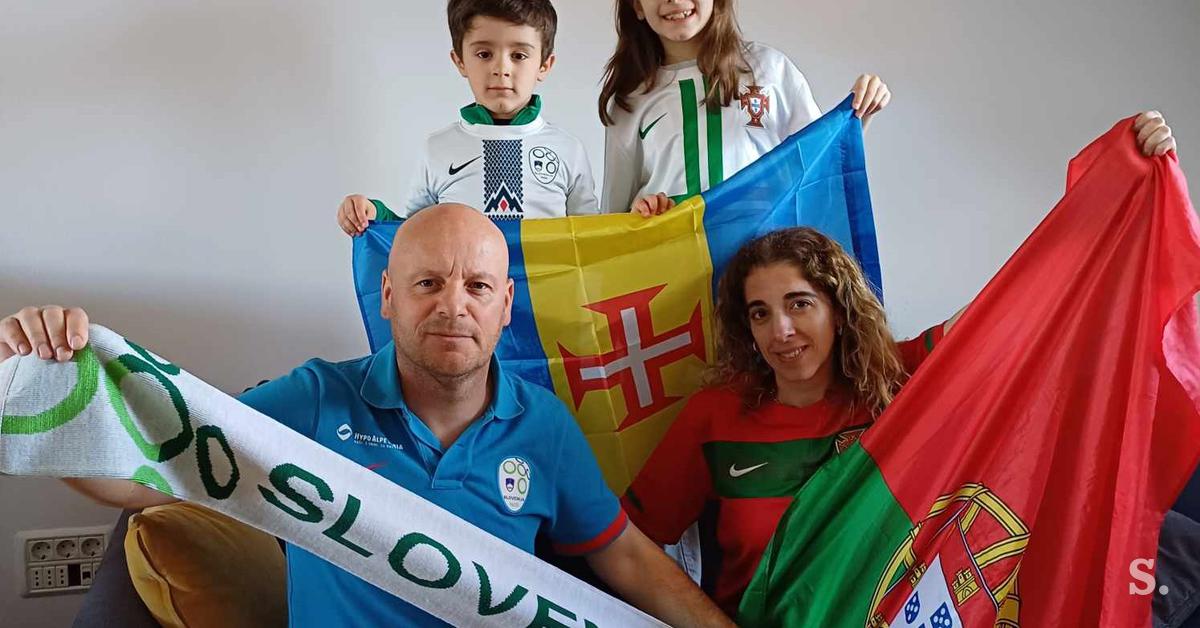 Uma bela família chegando a Stožice com até três bandeiras!