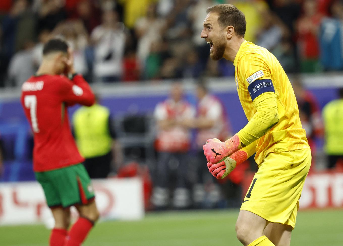 Jan Oblak defendeu o pênalti de Cristiano Ronaldo aos 105 minutos. | Foto: Reuters