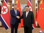 Ši Džinping in Kim Jong-un