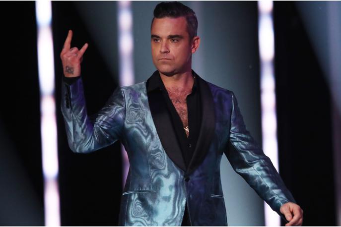 Robbie Williams | Robbie Williams in njegova soproga sta četrtega sina dobila s pomočjo nadomestne matere. | Foto Getty Images