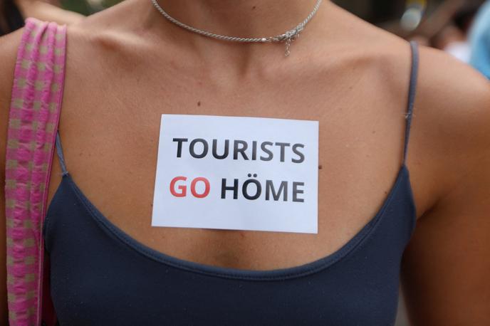 Turisti Mallorca | "Turisti, pojdite domov," je pisalo na transparentih.  | Foto Reuters