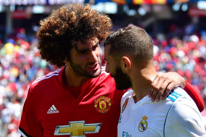 Marouane Fellaini | Marouane Fellaini je belgijskemu prvoligašu Standardu iz Liegea, kjer je začel svojo športno pot, posodil tri milijone evrov kot pomoč za preživetje kluba. | Foto Reuters