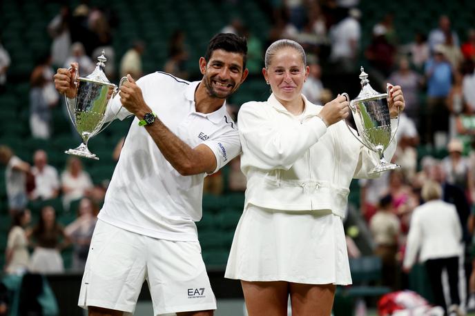 Jelena Ostapenko Marcelo Arevalo | Jelena Ostapenko in Marcelo Arevalo sta osvojila Wimbledon v mešanih dvojicah. | Foto Reuters