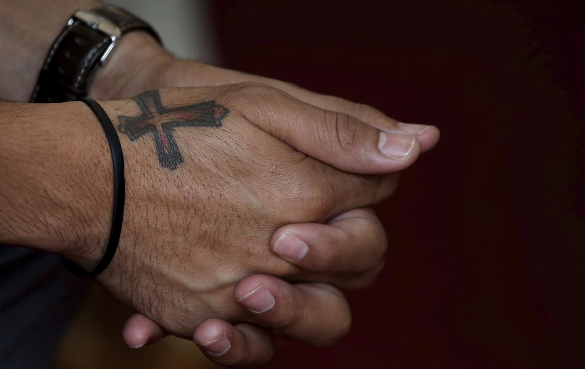 tetoviranje, tatu | Verniki so lahko izbirali med vrsto krščanskih motivov, med katerimi so različne podobe križa in ribe. (Fotografija je simbolična.) | Foto Guliverimage