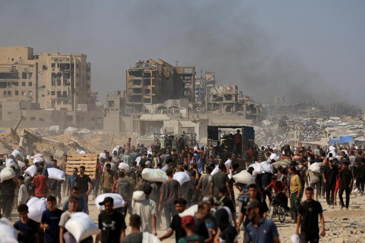 Gaza se zaradi vojne med Izraelom in Hamasom, ki traja že 22 mesecev, sooča s humanitarno katastrofo, vse več ljudi umira zaradi lakote. | Foto: Reuters