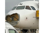 poškodovano letalo Austria Airilnes