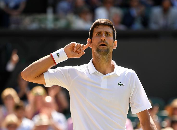 Novak Đoković bo še šestič zaigral v finalu Wimbledona, ki ga je doslej dobil v letih 2011, 2014, 2015 in 2018. | Foto: Reuters
