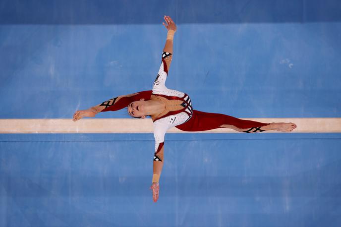 nemške gimnastičarke | Nemška gimnastičarka Pauline Schäfer je s kolegicami raje izbrala dres, ki zakriva noge. | Foto Reuters