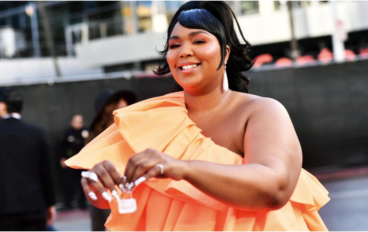 Lizzo | Lizzo je tokrat presenetila z najmanjšo torbico na rdeči preprogi. | Foto Getty Images