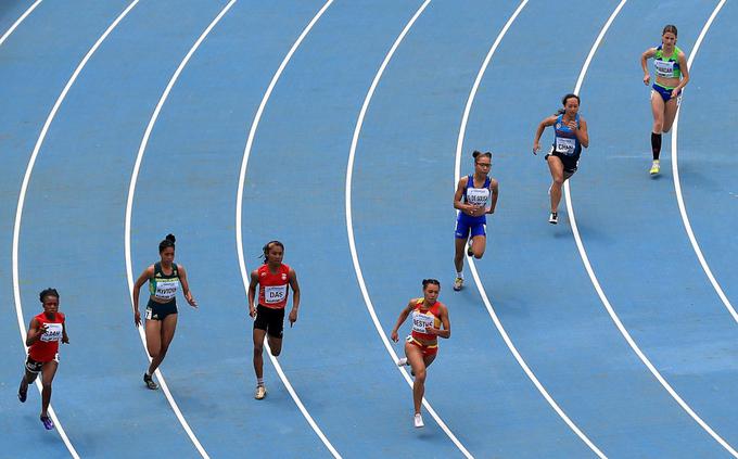 Tami Ščančar (skrajno desno) med tekom na 200 metrov | Foto: Getty Images