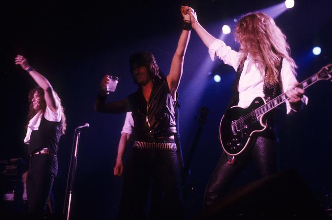 Skupina Whitesnake (David Coverdale, Cozy Powell in John Sykes) leta 1984 na koncertu na londonskem Wembleyju. | Foto: Guliverimage