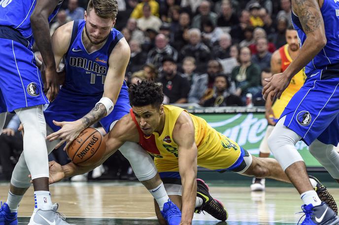 Luka Dončić | Luka Dončić je dosegel prvi trojni dvojček v ligi NBA. | Foto Reuters