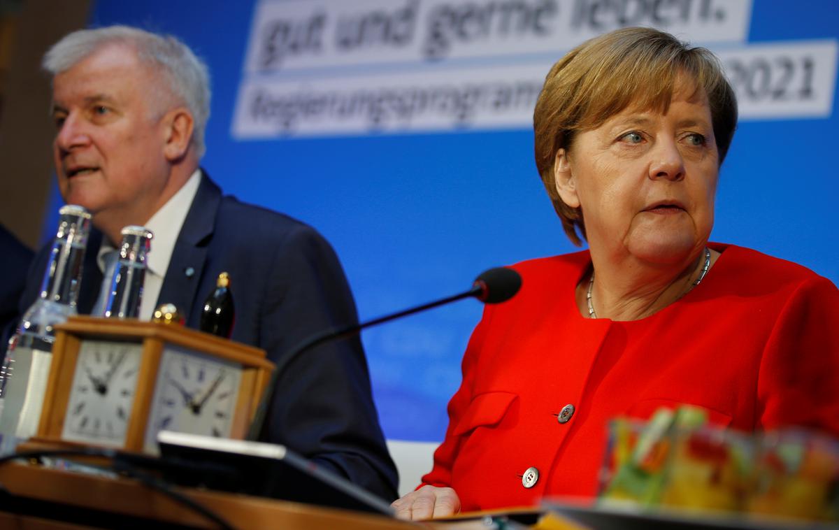 Horst Seehofer in Angela Merkel | Foto Reuters