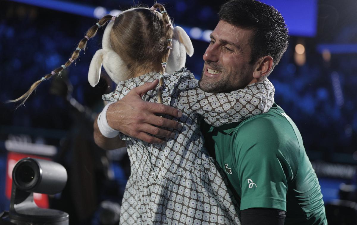 Novak Đoković | Novak Đoković v objemu s hčerko Taro | Foto Reuters