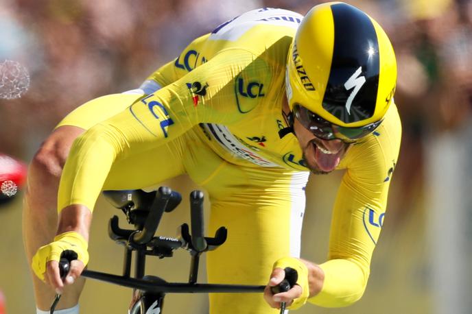 Julian Alaphilippe | Julian Alaphilippe v kronometru ni le ubranil rumene majice, z etapno zmago je še povečal prednost v skupnem seštevku. | Foto Reuters