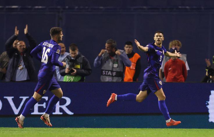 Andrej Kramarić je sredi drugega polčasa povišal vodstvo Hrvaške proti Škotski na 2:1.  | Foto: Reuters