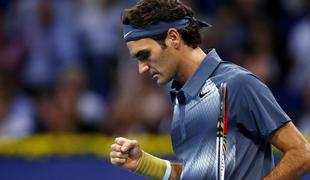 Isner zabil Poljaku 27 asov, Federer po londonsko vozovnico 
