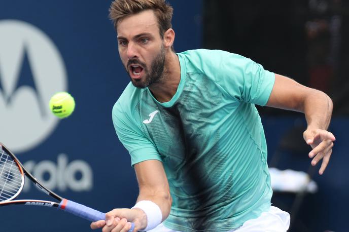 Marcel Granollers | Marcel Granollers je imel nevšečnosti na treningu, in sicer med tekom na plaži. | Foto Reuters