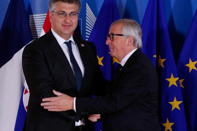 Andrej Plenković in Jean-Claude Juncker | V Zagrebu so prepričani, da bo Slovenija blokirala vstop Hrvaške v schengen. Na fotografiji hrvaški premier Andrej Plenković in odhajajoči predsednik Evropske komisije Jean-Claude Juncker. | Foto Reuters