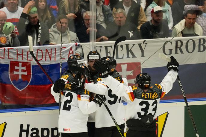 nemška hokejska reprezentanca | Nemci so branjenje srebrnega odličja začeli z zmago proti Slovakom. | Foto Guliverimage