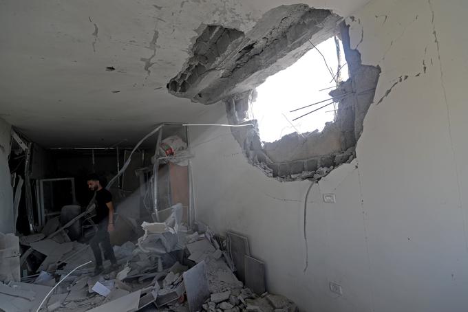 Hiša, poškodovana med izraelskim napadom na Gazo. | Foto: Reuters