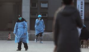 Skrivnostni virus se širi: prvi primer zunaj province Hubei #video #foto