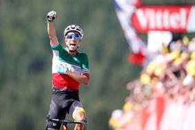 Aru dobil prvo etapo z gorskim ciljem, Froome oblekel rumeno majico