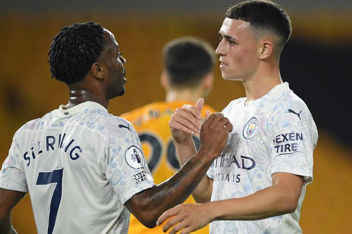 Manchester City | Phil Foden in Raheem Sterling proslavljata enega od treh golov Manchester Cityja. | Foto Reuters