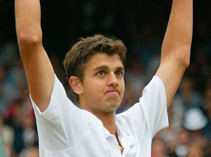 Leta 2002 je v Wimbledonu po treh nizih premagal Rogerja Federerja. | Foto: Guliverimage/Getty Images