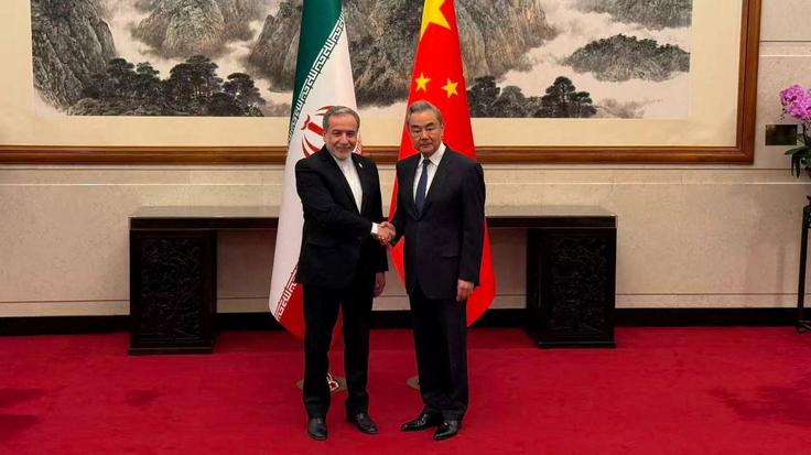 Vang Ji, Abas Aragči | Foto: Reuters