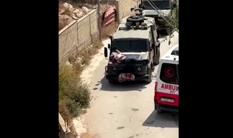 Grozljivo: Izraelci ranjenega Palestinca vozili privezanega na vozilu #video