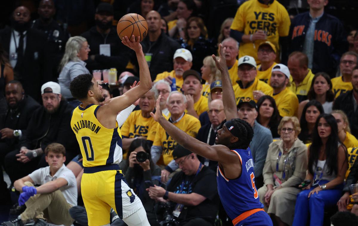 Tyrese Haliburton | Tyrese Haliburton je blestel ob zmagi Indiane, ki v seriji na štiri zmage zdaj vodi s 3:1. | Foto Reuters