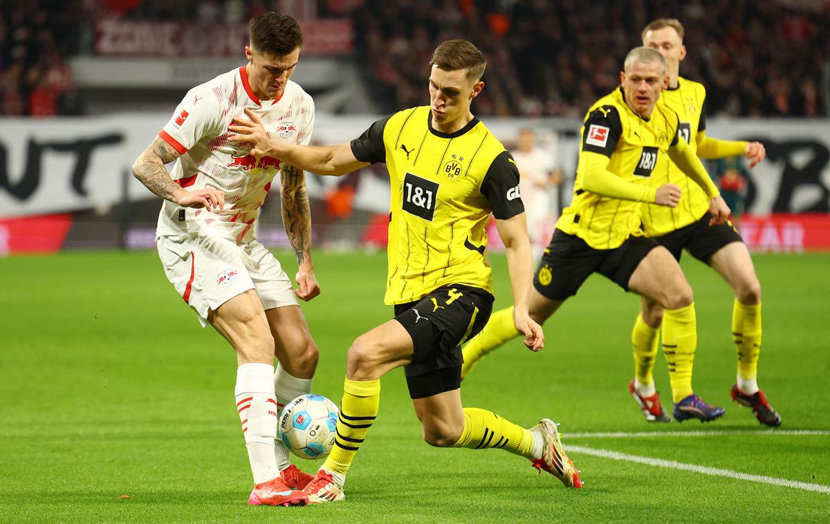 Benjamin Šeško | Benjamin Šeško je proti Borussii Dortmund odigral vso tekmo in prispeval podajo za zadetek. V ponedeljek bo pripotoval v domovino na reprezentančni zbor na Gorenjskem. | Foto Reuters