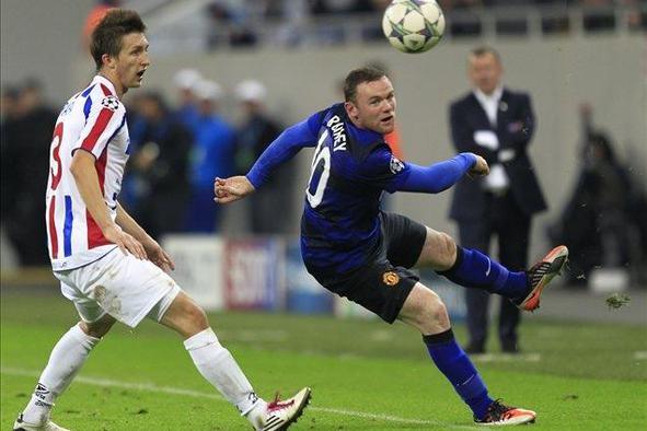 Rooney naj angleški strelec v ligi prvakov