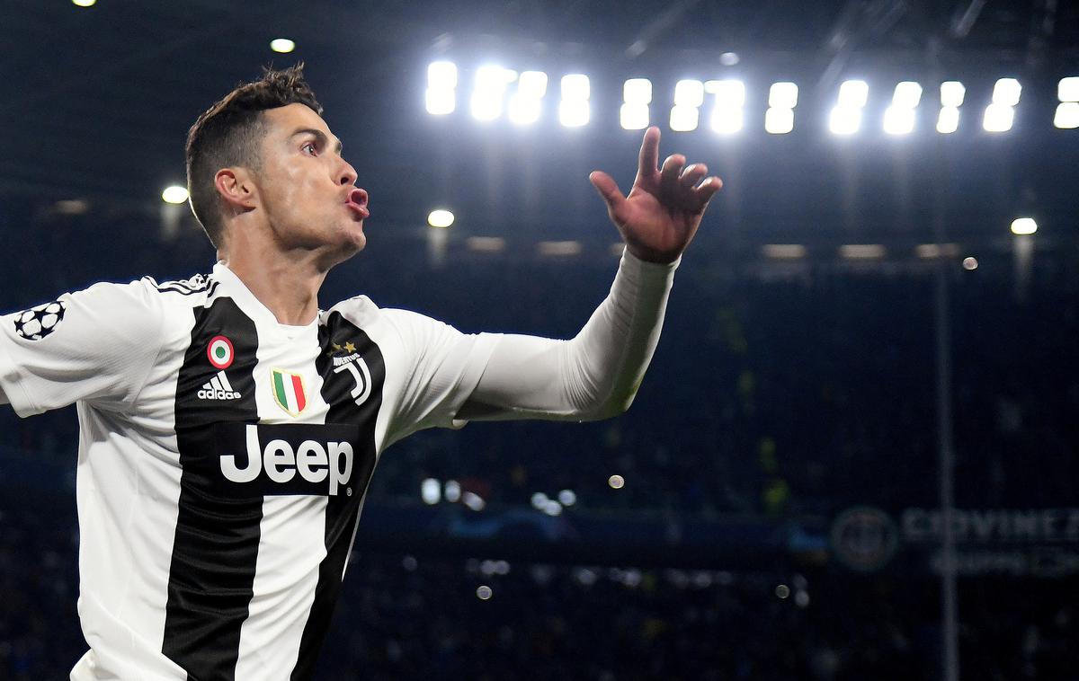Cristiano Ronaldo | Cristiano Ronaldo je poskrbel za nov sijajen večer v ligi prvakov in Juventus popeljal med najboljših osem. | Foto Reuters
